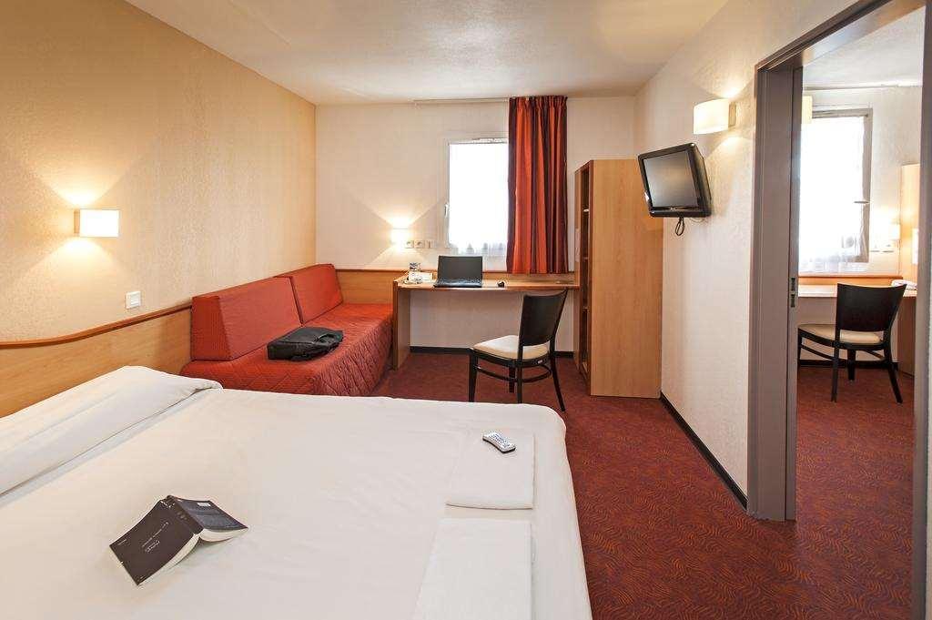 Brit Hotel Confort Montauban Quarto foto