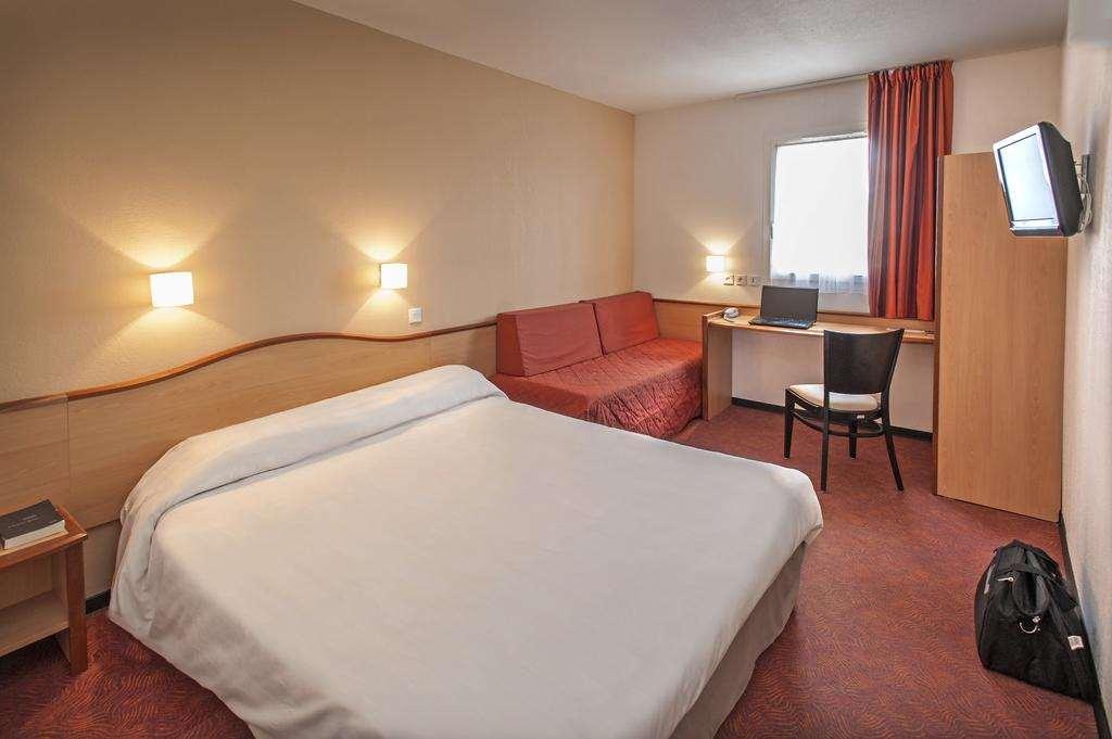 Brit Hotel Confort Montauban Quarto foto